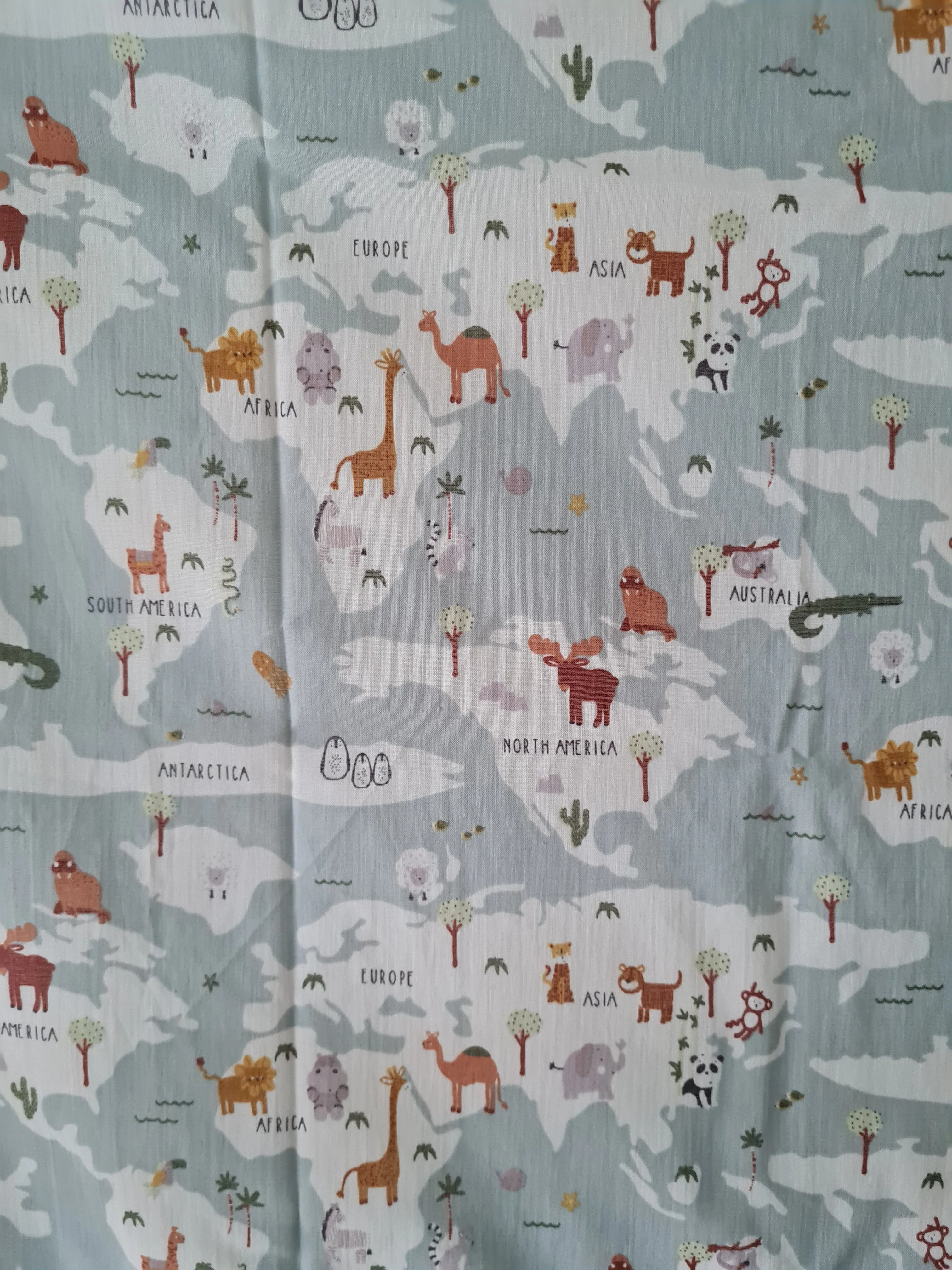 Around The World Cotton Muslin Swaddle