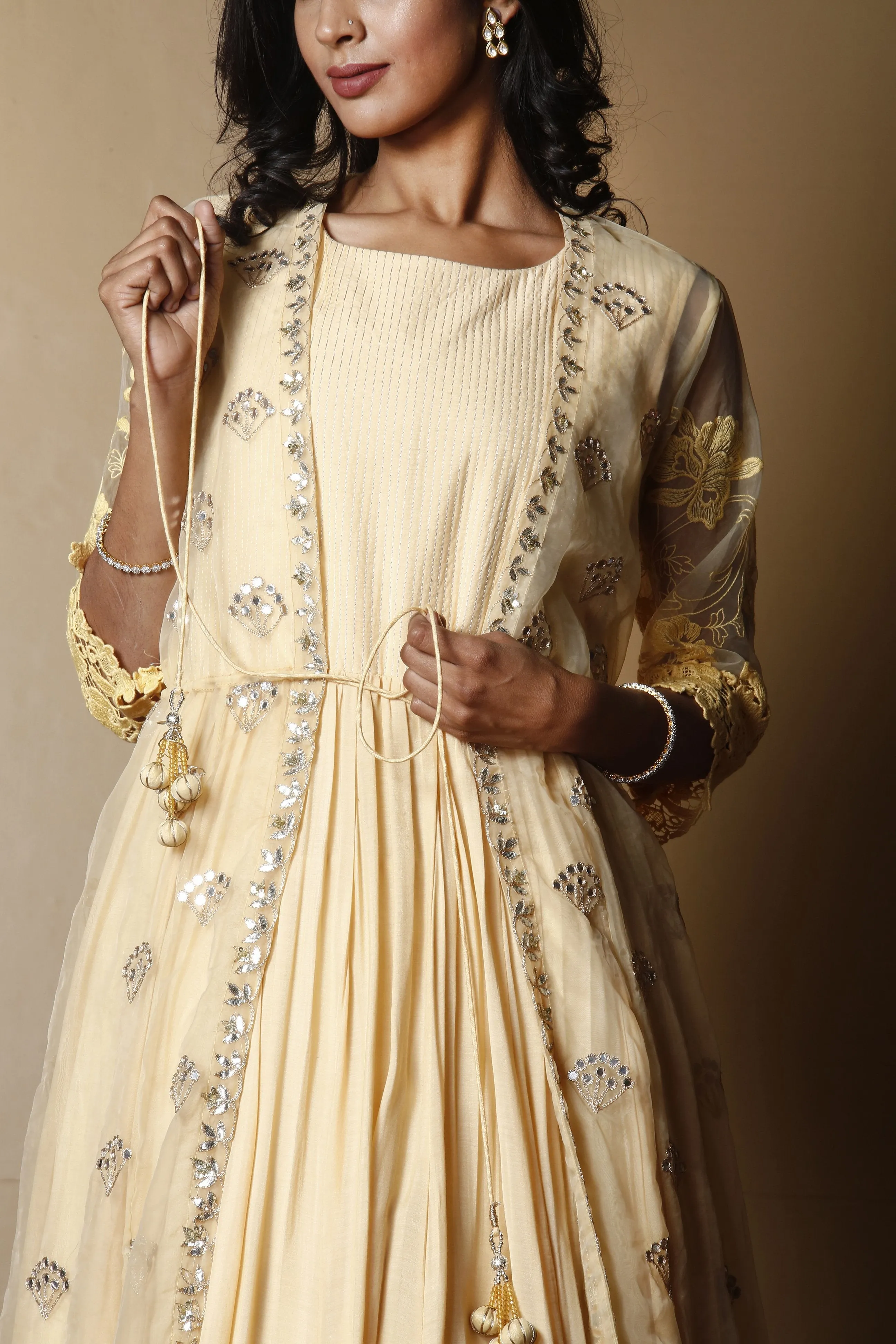 Cotton silk Suit in Yellow color with Aari, Gota Patti, Mirror, Sequins work.