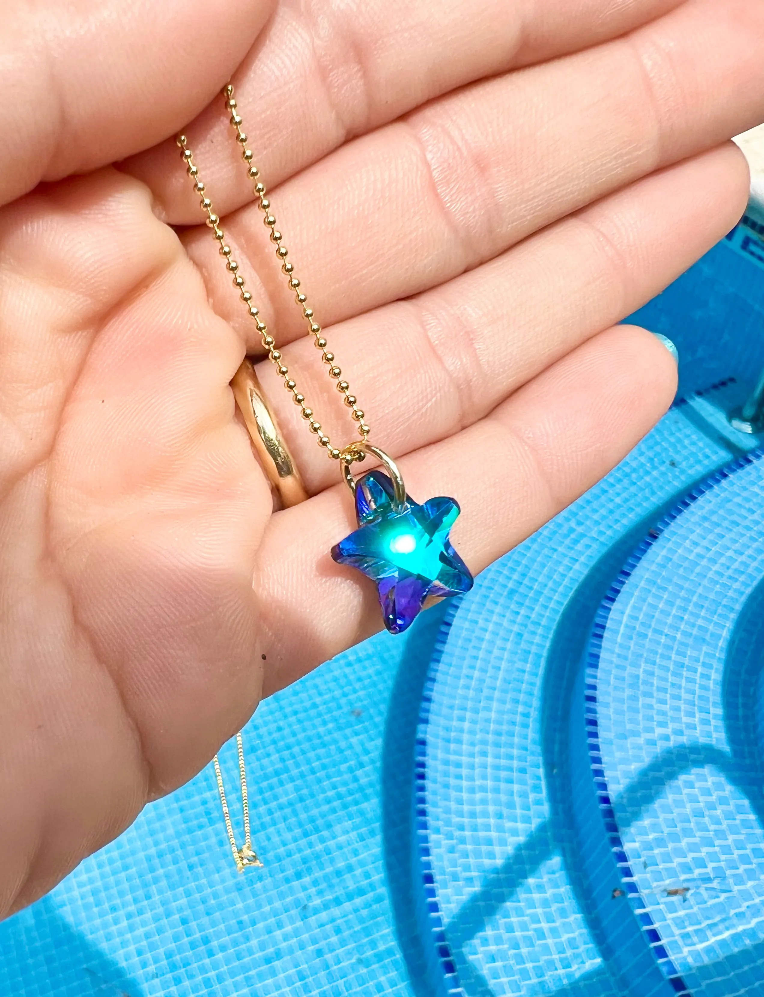 LITTLE MERMAID INSIDE STAR SWAROVSKI NECKLACE