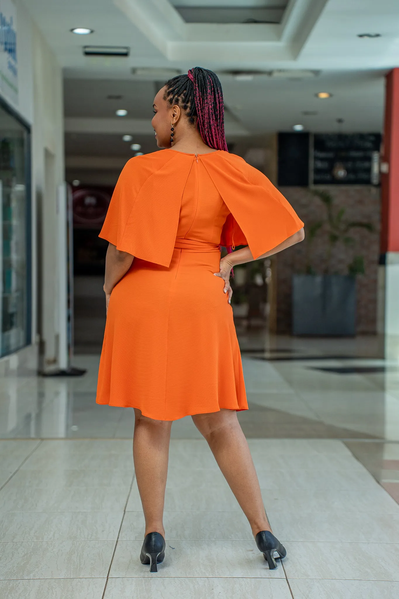 Tangerine cape belt dress